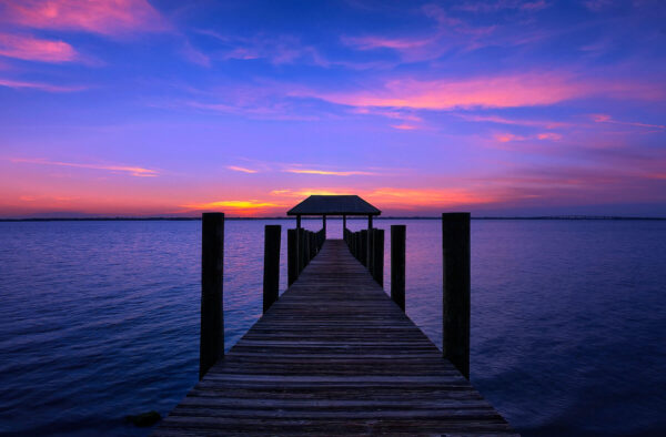 Sunset over House of Refuge pier in Stuart Florida