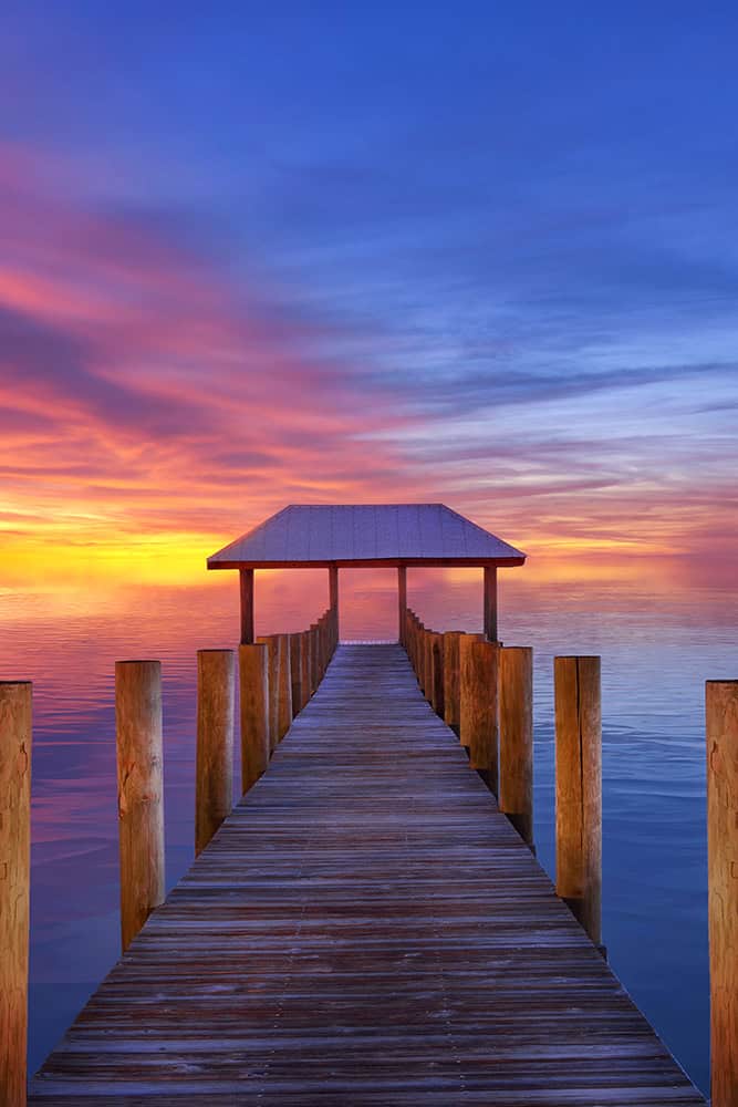 Sunset over House of Refuge Pier in Stuart Florida vertical