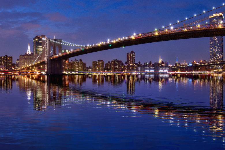 Sunset over New York City Manhattan Skyline Brooklyn Bridge